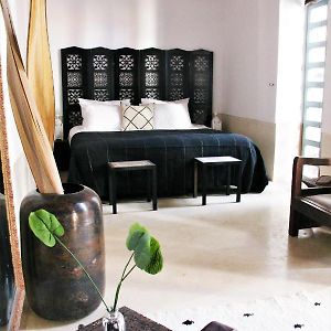 Suite met een Queen Size Bed